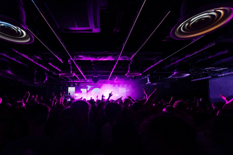 A few students supporting sports teams at an event